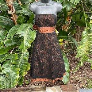 Metallic bronze and lace strapless, fit, and flare dress